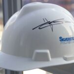 Original WTC Construction Hard Hats signed by Larry Silverstein
